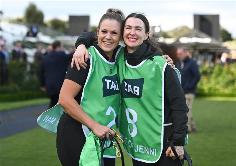 MELBOURNE, AUSTRALIA - MARCH 28: The strappers of Light Infantry Man and Pride of Jennis after they finished first and second in Race 8, the Tab Australian Cup during Melbourne Racing at Flemington Racecourse on March 28, 2026 in Melbourne, Australia. (Photo by Vince Caligiuri/Getty Images)