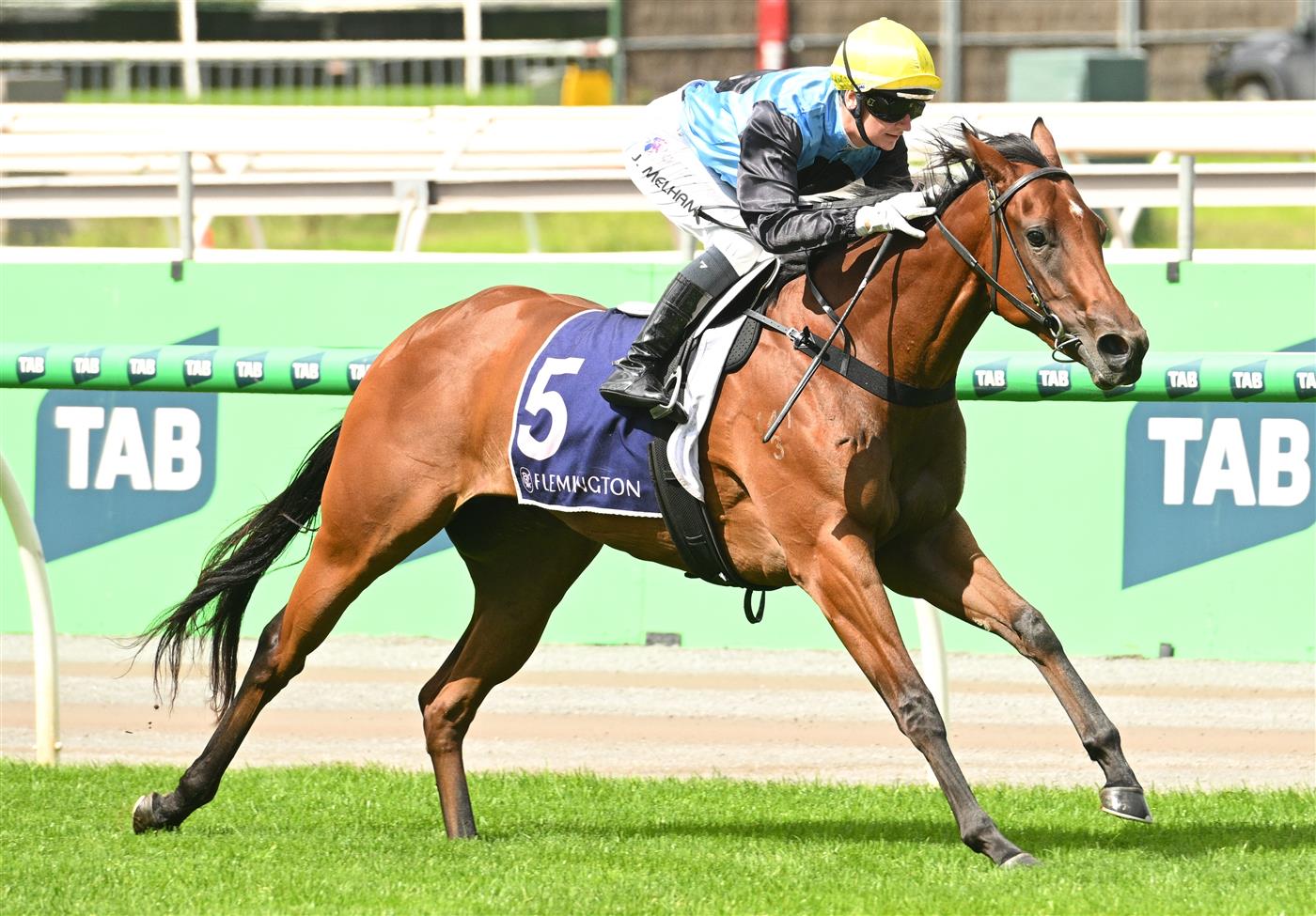MELBOURNE, AUSTRALIA - MARCH 28: Jamie Melham riding Satono Glow winning Race 3, the Tbv Thoroughbred Breeders Stakes during Melbourne Racing at Flemington Racecourse on March 28, 2026 in Melbourne, Australia. (Photo by Vince Caligiuri/Getty Images)