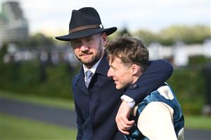 MELBOURNE, AUSTRALIA - MARCH 28: Harry Coffey and trainer Ciaron Maher after Light Infantry Man won Race 8, the Tab Australian Cup during Melbourne Racing at Flemington Racecourse on March 28, 2026 in Melbourne, Australia. (Photo by Vince Caligiuri/Getty Images)