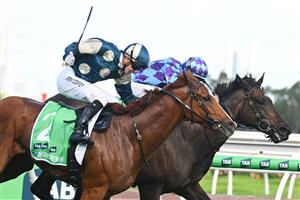 MELBOURNE, AUSTRALIA - MARCH 28: Harry Coffey riding Light Infantry Man defeats Declan Bates riding Pride of Jenni in Race 8, the Tab Australian Cup during Melbourne Racing at Flemington Racecourse on March 28, 2026 in Melbourne, Australia. (Photo by Vince Caligiuri/Getty Images)