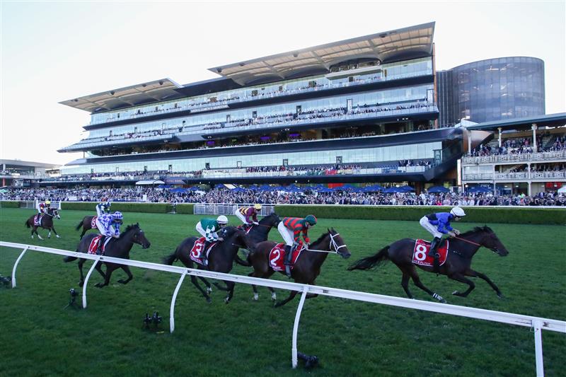 SYDNEY, AUSTRALIA - APRIL 11:  (EDITORS NOTE: Image taken using a remote camera.) Zac Lloyd riding Idle Flyer win Race 8 The Moet & Chandon Queen of the Turf Stakes during Sydney Racing at Royal Randwick Racecourse on April 11, 2026 in Sydney, Australia. (Photo by Jason McCawley/Getty Images)