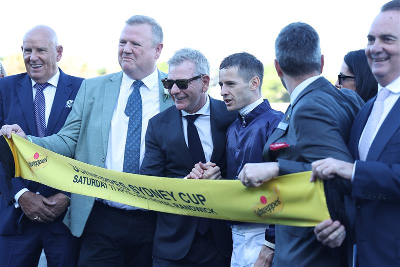 SYDNEY, AUSTRALIA - APRIL 11: Jason Collett riding Changingoftheguard win Race 7 Schweppes Sydney Cup during Sydney Racing at Royal Randwick Racecourse on April 11, 2026 in Sydney, Australia. (Photo by Jeremy Ng/Getty Images)