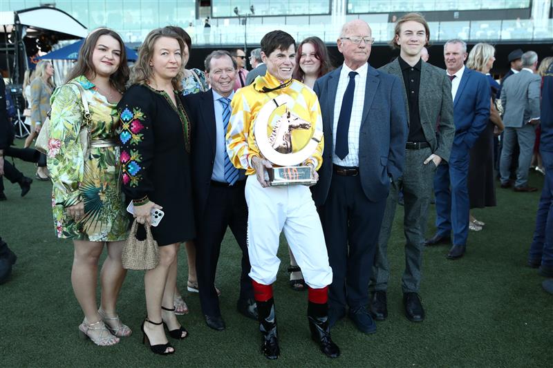 SYDNEY, AUSTRALIA - APRIL 11: Craig Williams riding Sir Delius celebrates with his family after winning Race 9 The Queen Elizabeth Stakes during Sydney Racing at Royal Randwick Racecourse on April 11, 2026 in Sydney, Australia. (Photo by Jason McCawley/Getty Images)