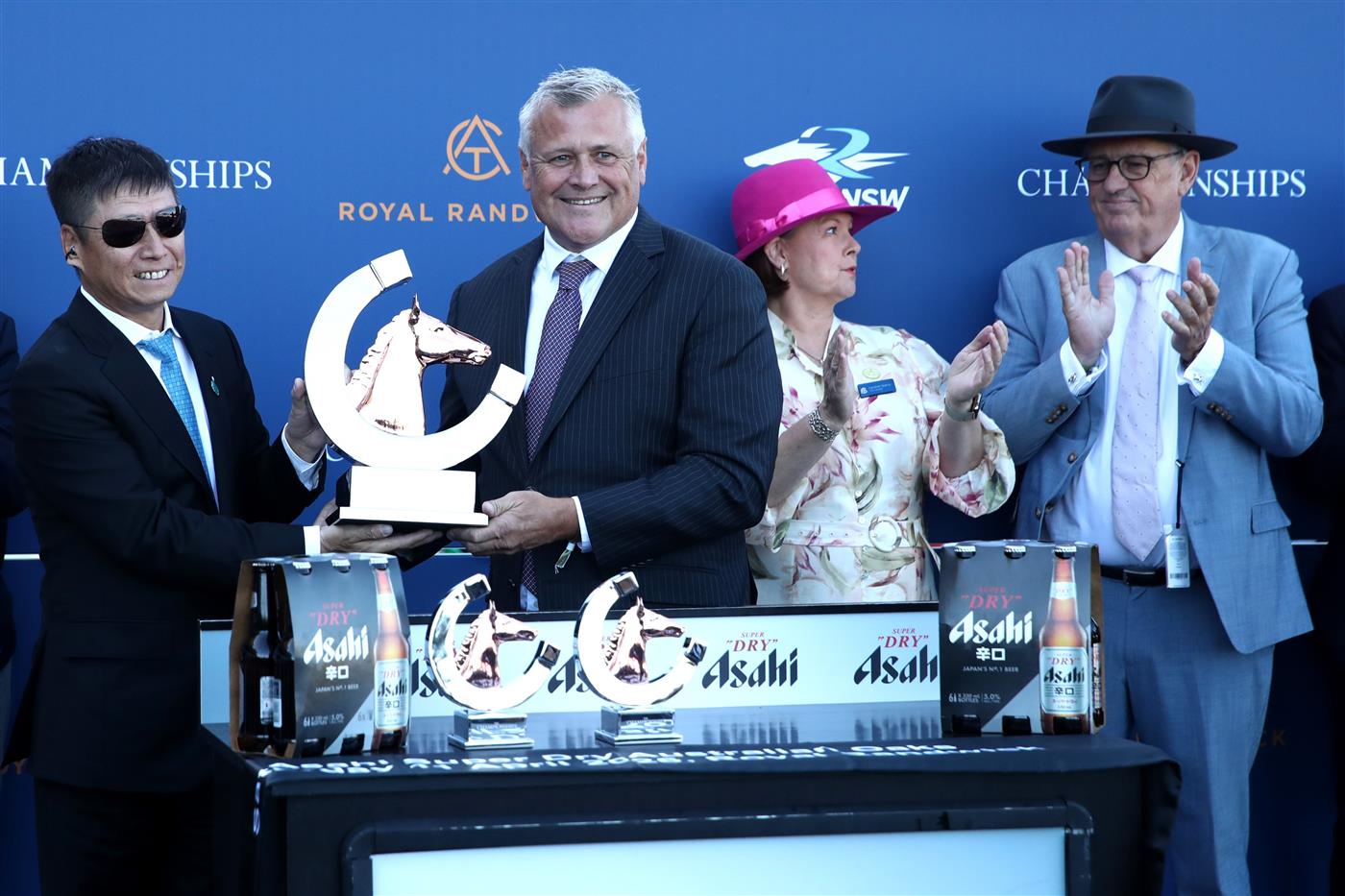 SYDNEY, AUSTRALIA - APRIL 11: Yuesheng Zhang owner of Ohope Wins celebrates winning Race 5 The Asahi Super Dry Australian Oaks during Sydney Racing at Royal Randwick Racecourse on April 11, 2026 in Sydney, Australia. (Photo by Jason McCawley/Getty Images)