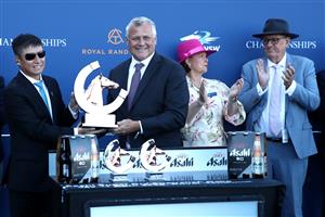 SYDNEY, AUSTRALIA - APRIL 11: Yuesheng Zhang owner of Ohope Wins celebrates winning Race 5 The Asahi Super Dry Australian Oaks during Sydney Racing at Royal Randwick Racecourse on April 11, 2026 in Sydney, Australia. (Photo by Jason McCawley/Getty Images)