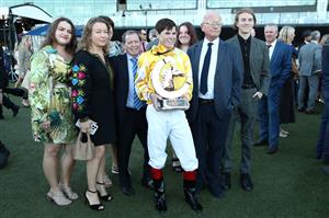 SYDNEY, AUSTRALIA - APRIL 11: Craig Williams riding Sir Delius celebrates with his family after winning Race 9 The Queen Elizabeth Stakes during Sydney Racing at Royal Randwick Racecourse on April 11, 2026 in Sydney, Australia. (Photo by Jason McCawley/Getty Images)