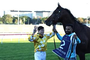 SYDNEY, AUSTRALIA - APRIL 11: Craig Williams riding Sir Delius win Race 9 Queen Elizabeth Stakes during Sydney Racing at Royal Randwick Racecourse on April 11, 2026 in Sydney, Australia. (Photo by Jeremy Ng/Getty Images)
