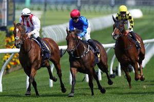 SYDNEY, AUSTRALIA - APRIL 11: Damian Lane (white cap) riding Beskar win Race 2 The Bisley Workwear South Pacific Classic during Sydney Racing at Royal Randwick Racecourse on April 11, 2026 in Sydney, Australia. (Photo by Jason McCawley/Getty Images)