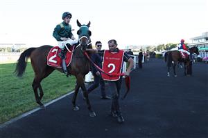 SYDNEY, AUSTRALIA - APRIL 18: Tim Clark riding Fireball win Race 7 Moet & Chandon Champagne Stakes during Sydney Racing at Royal Randwick Racecourse on April 18, 2026 in Sydney, Australia. (Photo by Jeremy Ng/Getty Images)