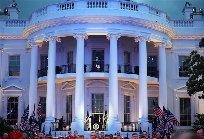 US President Donald Trump and UFC President and CEO Dana White look on during the national anthem during UFC Freedom 250 at the White House on June 14, 2026 in Washington, DC. (Photo by Chris Graythen/Getty Images)