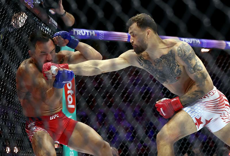 Mauricio Ruffy of Brazil lands a punch on Michael Chandler of the United States during UFC Freedom 250 at the White House on June 14, 2026 in Washington, DC. (Photo by Chris Graythen/Getty Images)