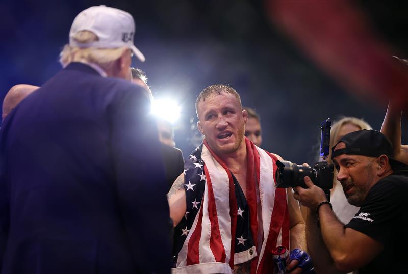 Justin Gaethje of the United States shakes the hand of US President Donald Trump after defeating Ilia Topuria of Georgia in the UFC Lightweight Championship bout during UFC Freedom 250 at the White House on June 14, 2026 in Washington, DC. (Photo by Chris Graythen/Getty Images)