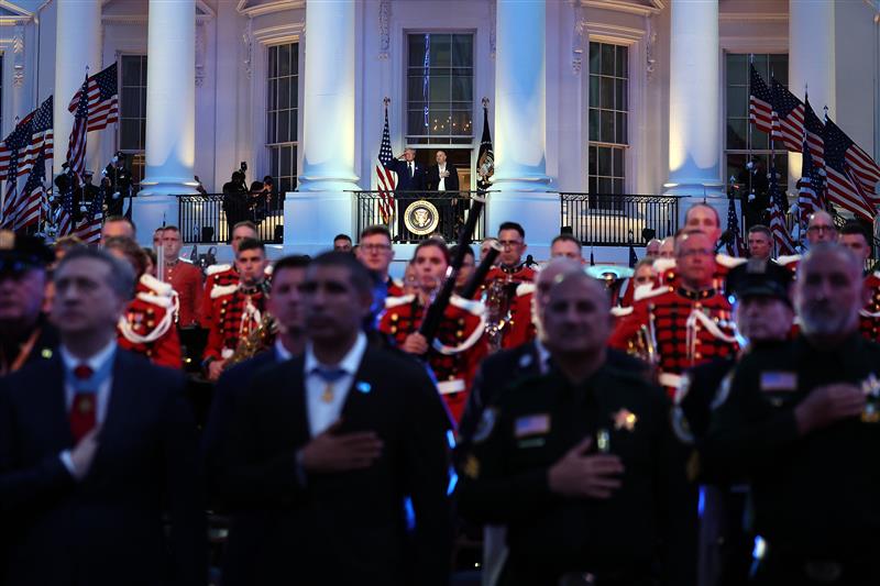 US President Donald Trump and UFC President and CEO Dana White look on during the national anthem during UFC Freedom 250 at the White House on June 14, 2026 in Washington, DC. (Photo by Chris Graythen/Getty Images)
