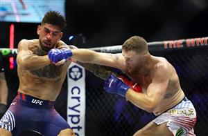 Ilia Topuria of Georgia and Justin Gaethje of the United States exchange punches in the UFC Lightweight Championship bout during UFC Freedom 250 at the White House on June 14, 2026 in Washington, DC. (Photo by Chris Graythen/Getty Images)