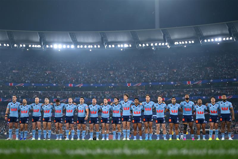 The New South Wales Blues line up for the national anthem ahead of Game 2 of the 2026 State of Origin series between the New South Wales Blues and Queensland Maroons at the Melbourne Cricket Ground on June 17, 2026 in Melbourne, Australia. (Getty)