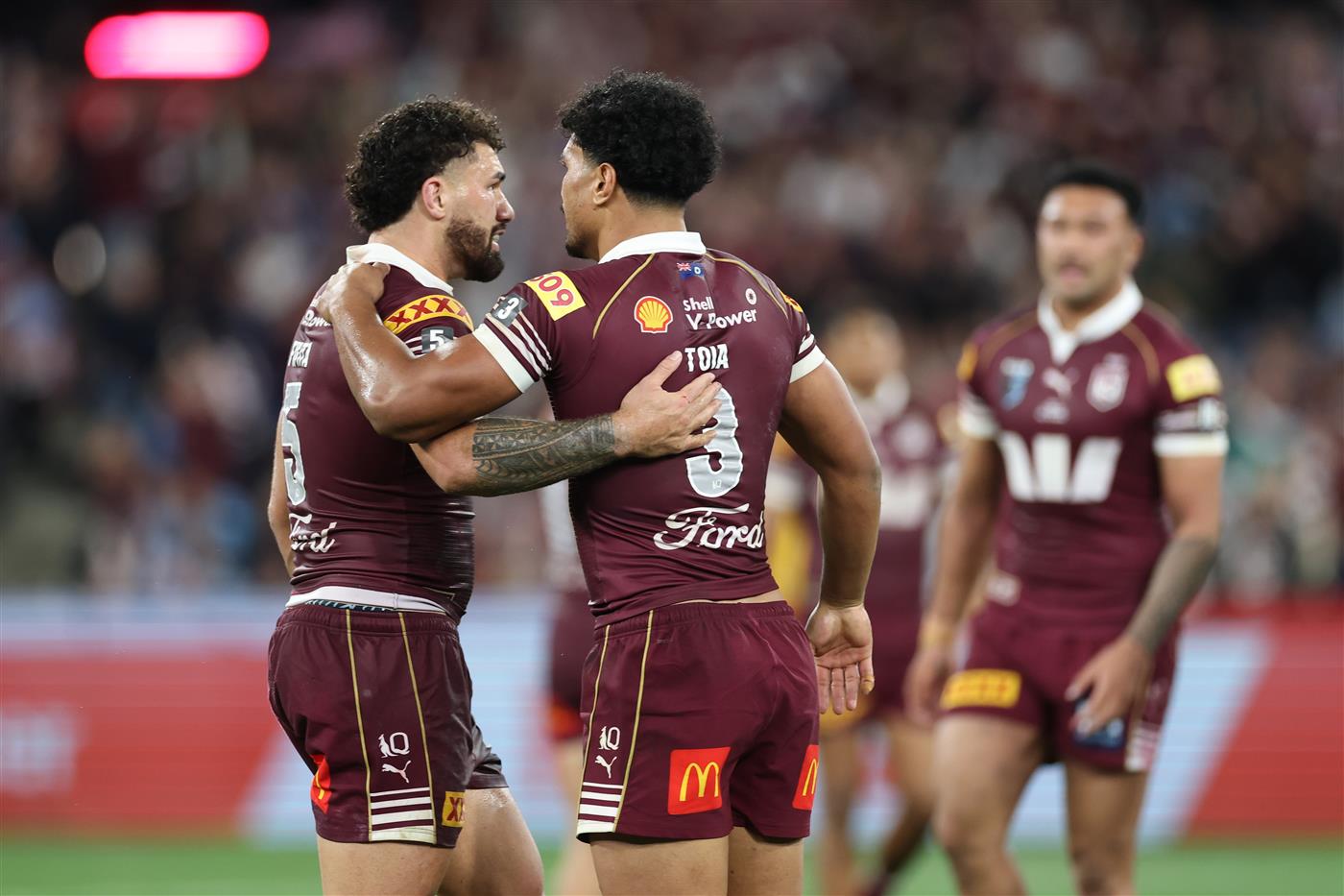 Jojo Fifita and Robert Toia of the Queensland Maroons embrace at full-time following Game 2 of the 2026 State of Origin series between the New South Wales Blues and Queensland Maroons at the Melbourne Cricket Ground on June 17, 2026 in Melbourne, Australia.