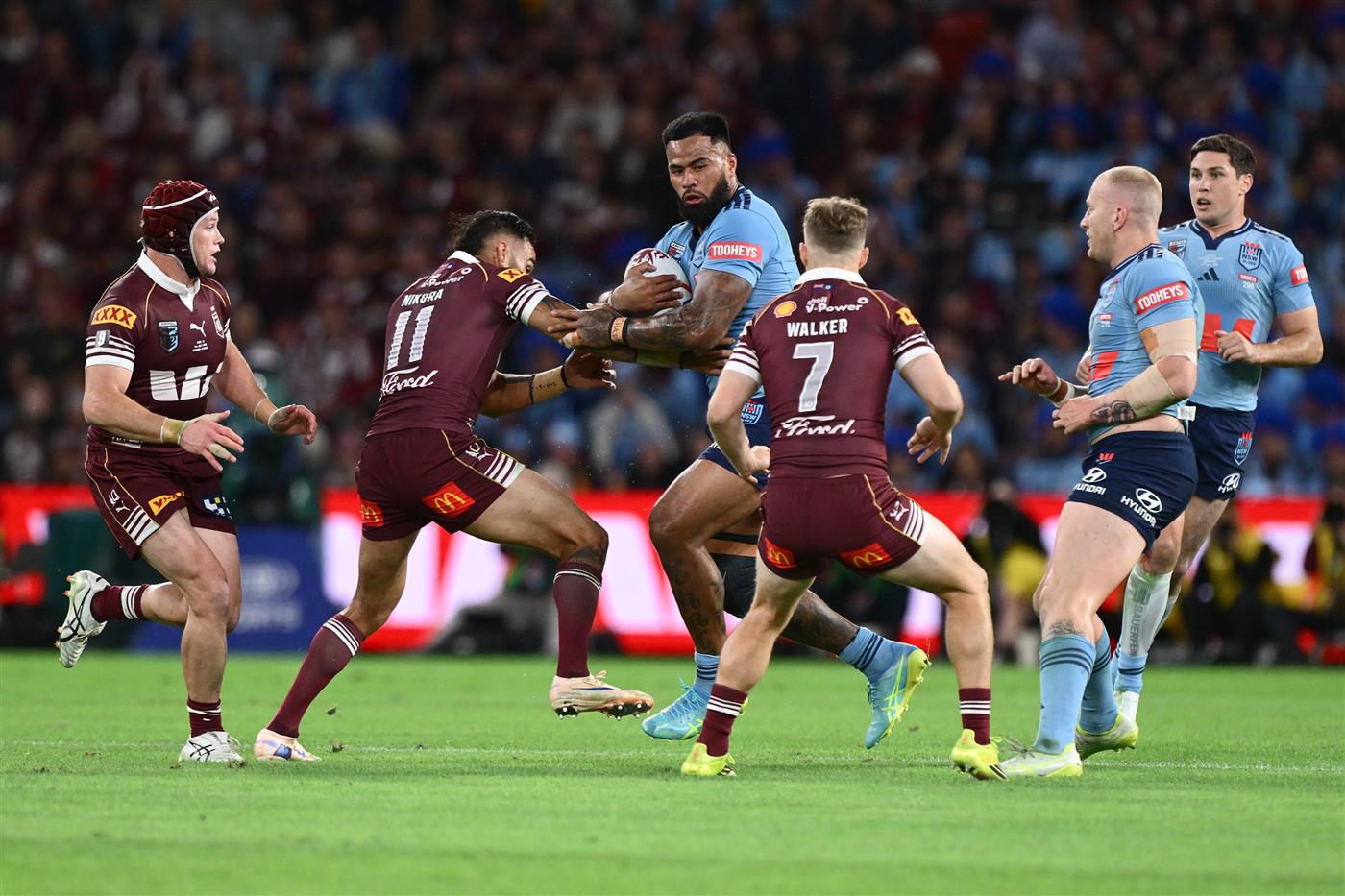 Haas powers into the defensive line (Getty)