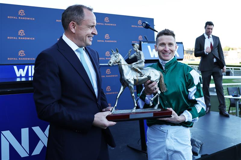 SYDNEY, AUSTRALIA - AUGUST 23: Trainer Chris Waller celebrates after James McDonald riding  Via Sistina win Race 8 Winx Stakes during Sydney Racing at Royal Randwick Racecourse on August 23, 2025 in Sydney, Australia. (Photo by Jeremy Ng/Getty Images)