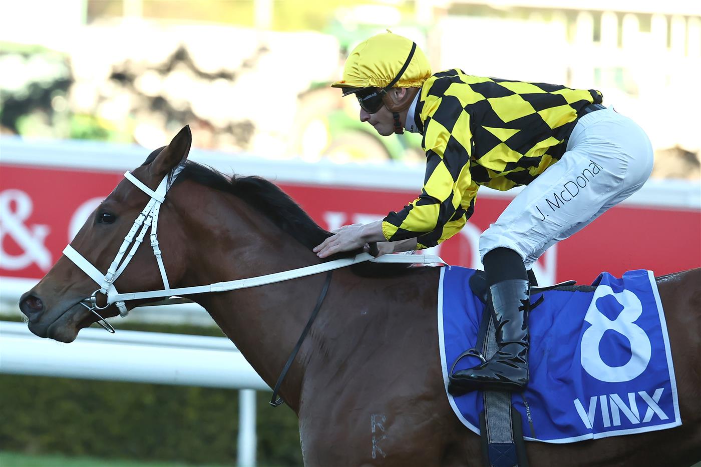 SYDNEY, AUSTRALIA - AUGUST 22: James McDonald  riding Autumn Glow win Race 9 Winx Stakes during Sydney Racing at Royal Randwick Racecourse on August 22, 2026 in Sydney, Australia. (Photo by Jeremy Ng/Getty Images)