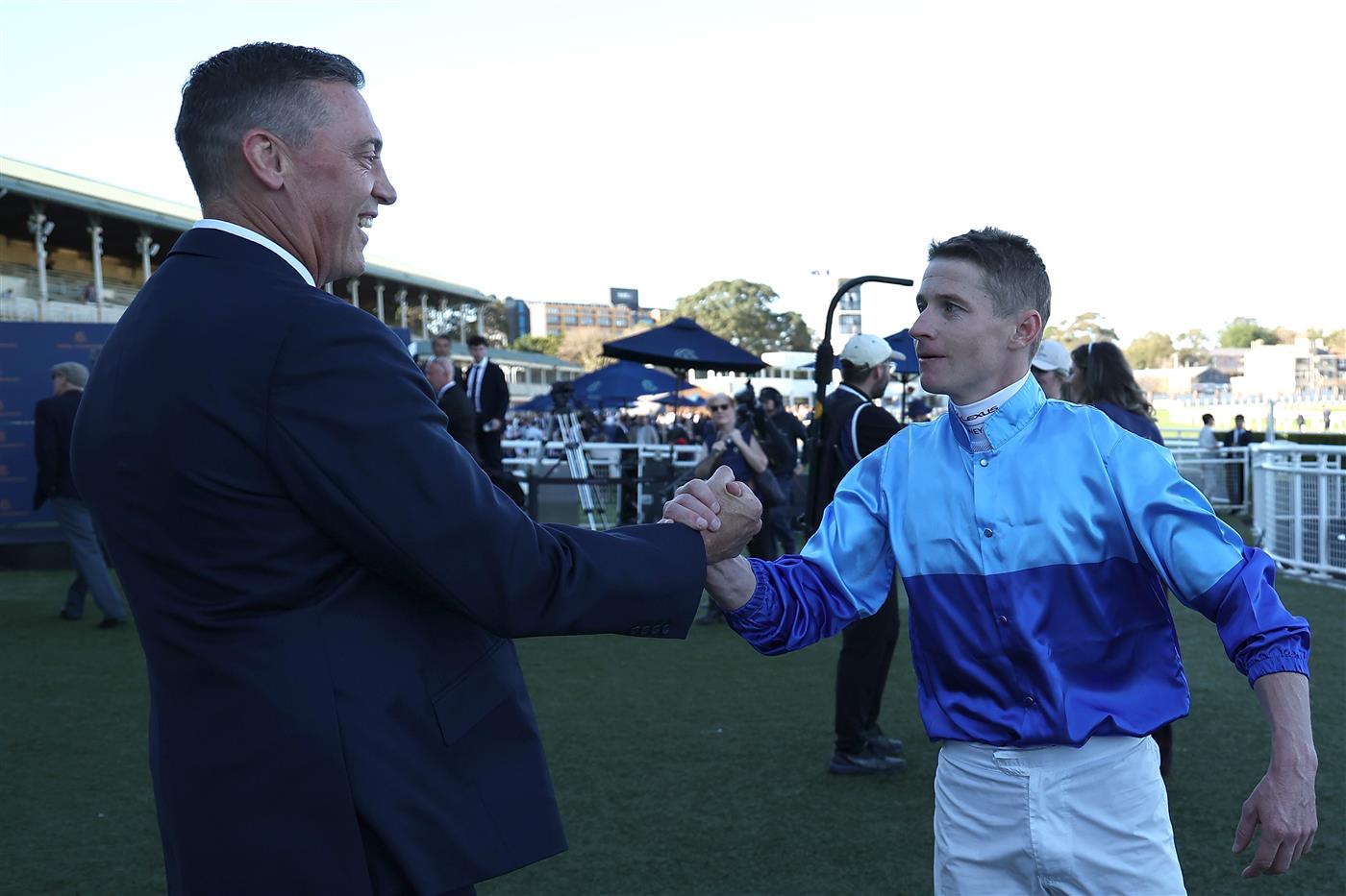 SYDNEY, AUSTRALIA - AUGUST 22: Trainer Tony Gollan celebrates after James McDonald  riding Pembrey win Race 7 HKJC World Pool Silver Shadow Stakes during Sydney Racing at Royal Randwick Racecourse on August 22, 2026 in Sydney, Australia. (Photo by Jeremy Ng/Getty Images)