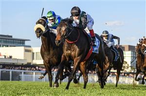 MELBOURNE, AUSTRALIA - SEPTEMBER 02: Craig Williams riding Mr Brightside defeats Luke Nolen riding I Wish I Win (3rd place) in Race 9, the Stow Storage Memsie Stakes, during Melbourne Racing at Caulfield Racecourse on September 02, 2023 in Melbourne, Australia. (Photo by Vince Caligiuri/Getty Images)