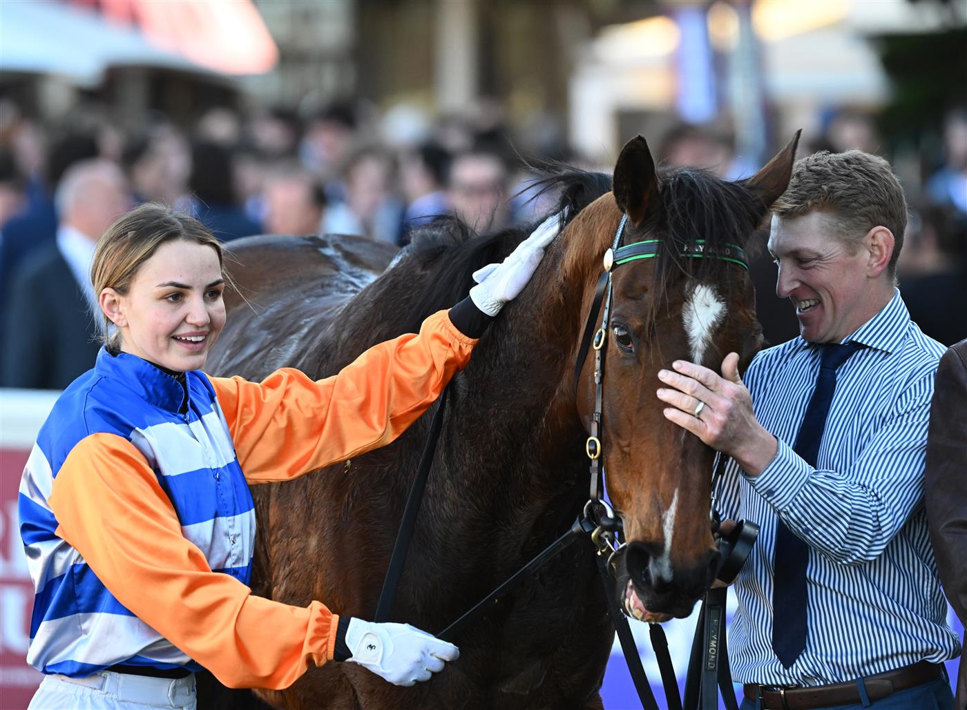 MELBOURNE, AUSTRALIA - AUGUST 29: Dakotah Keane poses with trainer Patrick Bell after riding Home Rule to win race 4, the Hygain Handicap during Melbourne Racing at Caulfield Racecourse on August 29, 2026 in Melbourne, Australia. (Photo by Vince Caligiuri/Getty Images)