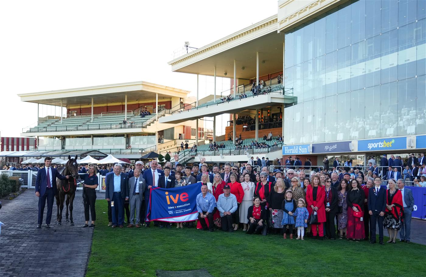 MELBOURNE, AUSTRALIA - AUGUST 29: Winning connections of American Eagle after winning race 7, the Ive > Mcneil Stakes during Melbourne Racing at Caulfield Racecourse on August 29, 2026 in Melbourne, Australia. (Photo by Vince Caligiuri/Getty Images)