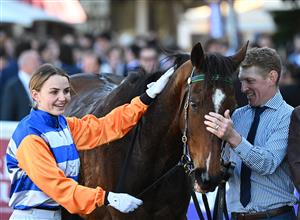 MELBOURNE, AUSTRALIA - AUGUST 29: Dakotah Keane poses with trainer Patrick Bell after riding Home Rule to win race 4, the Hygain Handicap during Melbourne Racing at Caulfield Racecourse on August 29, 2026 in Melbourne, Australia. (Photo by Vince Caligiuri/Getty Images)