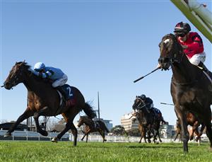 MELBOURNE, AUSTRALIA - AUGUST 29: Mark Zahra riding American Eagle (r) defeats Thomas Stockdale riding Unit Five in race 7, the Ive > Mcneil Stakes during Melbourne Racing at Caulfield Racecourse on August 29, 2026 in Melbourne, Australia. (Photo by Vince Caligiuri/Getty Images)