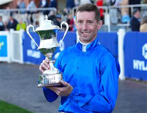 MELBOURNE, AUSTRALIA - AUGUST 29: Nash Rawiller poses with trophy after riding Beiwacht to win race 8, the Stow Storage Memsie Stakes during Melbourne Racing at Caulfield Racecourse on August 29, 2026 in Melbourne, Australia. (Photo by Vince Caligiuri/Getty Images)