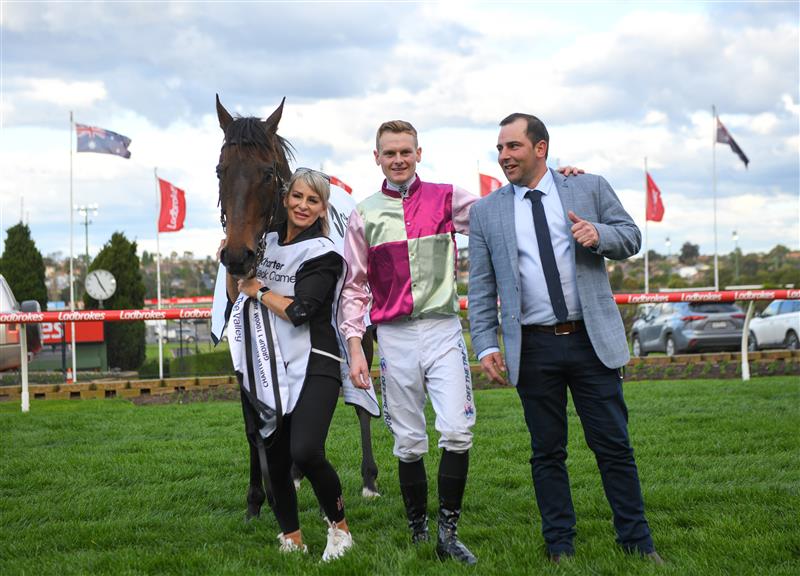MELBOURNE, AUSTRALIA - SEPTEMBER 07: Ethan Brown poses with Trainer Gavin Bedggood and strapper Karen Flaherty after riding Mornington Glory to win in Race 9, the Charter Keck Cramer Moir Stakes - Betting Odds during Melbourne Racing at Moonee Valley Racecourse on September 07, 2024 in Melbourne, Australia. (Photo by Vince Caligiuri/Getty Images)