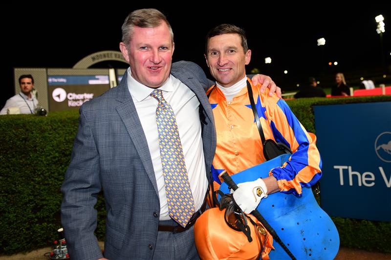 MELBOURNE, AUSTRALIA - SEPTEMBER 29: Opie Bosson poses with trainer Mark Walker after riding Imperatriz to win Race 7, the Charter Keck Cramer Moir Stakes, during Melbourne Racing at Moonee Valley Racecourse on September 29, 2023 in Melbourne, Australia. (Photo by Vince Caligiuri/Getty Images)