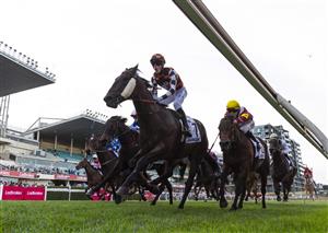 MELBOURNE, AUSTRALIA - SEPTEMBER 06: Ben Allen riding Baraqiel defeats Craig Williams riding Alabama Lass and Harry Coffey riding Arabian Summer (r) in Race 9, the Charter Keck Cramer Moir Stakes  during Melbourne Racing at Moonee Valley Racecourse on September 06, 2025 in Melbourne, Australia. (Photo by Vince Caligiuri/Getty Images)