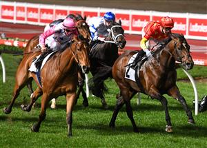MELBOURNE, AUSTRALIA - SEPTEMBER 24: Daniel Moor riding Wild Ruler (r) winning Race 7, the Charter Keck Cramer Moir Stakes, during Melbourne Racing at Moonee Valley Racecourse on September 24, 2021 in Melbourne, Australia. (Photo by Vince Caligiuri/Getty Images)