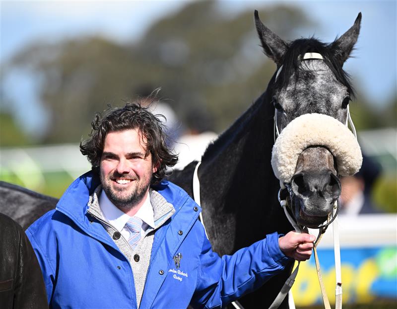 MELBOURNE, AUSTRALIA - SEPTEMBER 05: Trainer Damien Moyle poses with Pretty Baby after winning race 5, the Msc Signs Atlantic Jewel Stakes during Melbourne Racing at Sandown Racecourse on September 05, 2026 in Melbourne, Australia. (Photo by Vince Caligiuri/Getty Images)