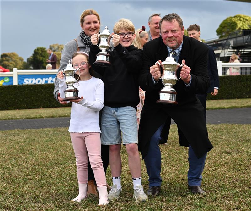 MELBOURNE, AUSTRALIA - SEPTEMBER 05: Trainer John McArdle poses with family after My Gladiola wo race 8, the Charter Keck Cramer Moir Stakes during Melbourne Racing at Sandown Racecourse on September 05, 2026 in Melbourne, Australia. (Photo by Vince Caligiuri/Getty Images)