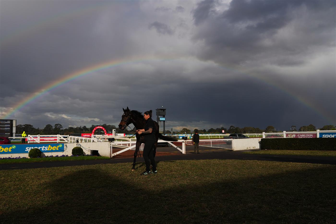 MELBOURNE, AUSTRALIA - SEPTEMBER 05: Evaporate poses as a rainbow appears after winning race 7, the Ranvet So You Think Stakes during Melbourne Racing at Sandown Racecourse on September 05, 2026 in Melbourne, Australia. (Photo by Vince Caligiuri/Getty Images)
