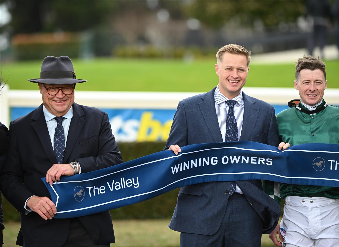 MELBOURNE, AUSTRALIA - SEPTEMBER 05: Co trainers Tony McEvoy and Calvin McEvoy pose after Harry Coffey rode Lepolo to win race 1, the The Valley @ Sandown Handicap during Melbourne Racing at Sandown Racecourse on September 05, 2026 in Melbourne, Australia. (Photo by Vince Caligiuri/Getty Images)