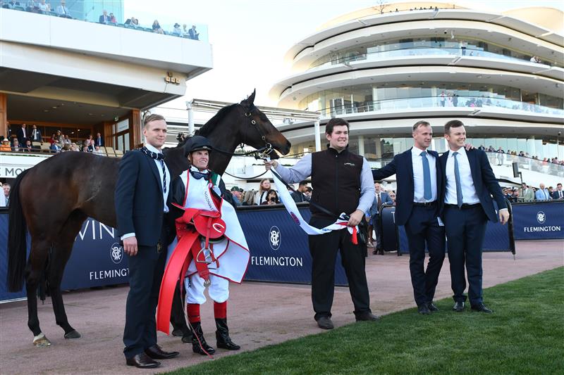 MELBOURNE, AUSTRALIA - SEPTEMBER 16: Craig Williams poses with Will Hayes (L), JD Hayes and Ben Hayes after riding Mr Brightside to win Race 7, the Pfd Food Services Makybe Diva Stakes, during Melbourne Racing at Flemington Racecourse on September 16, 2023 in Melbourne, Australia. (Photo by Vince Caligiuri/Getty Images)