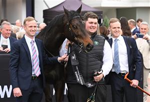 MELBOURNE, AUSTRALIA - SEPTEMBER 13: Strapper Will Evans poses with Co trainers JD Hayes and Will Hayes (r) after Mr Brightside won Race 8, the Crown Makybe Diva Stakes during Melbourne Racing at Flemington Racecourse on September 13, 2025 in Melbourne, Australia. (Photo by Vince Caligiuri/Getty Images)