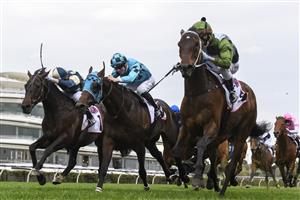 MELBOURNE, AUSTRALIA - SEPTEMBER 11: Brett Prebble riding Incentivise defeats Jye McNeil riding Mo'unga in the 2021 Makybe Diva Stakes. (Getty)