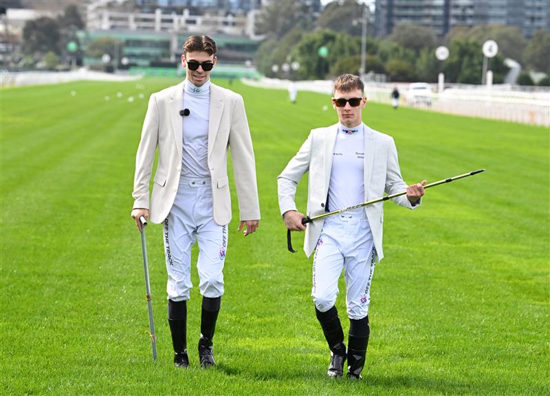 MELBOURNE, AUSTRALIA - SEPTEMBER 12: Jett Stanley and Jabez Johnstone walk the track ahead of Melbourne Racing at Flemington Racecourse on September 12, 2026 in Melbourne, Australia. (Photo by Vince Caligiuri/Getty Images)