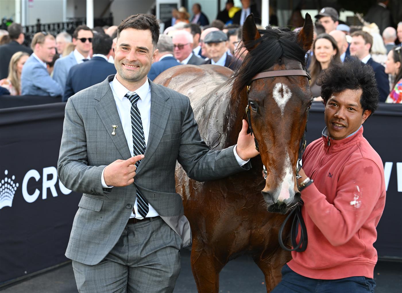 MELBOURNE, AUSTRALIA - SEPTEMBER 12: Trainer Tyler Donaldson-Aitken (L) poses with Welcolmetotheshow after winning race 6, the De Bortoli Tontonan Stakes during Melbourne Racing at Flemington Racecourse on September 12, 2026 in Melbourne, Australia. (Photo by Vince Caligiuri/Getty Images)