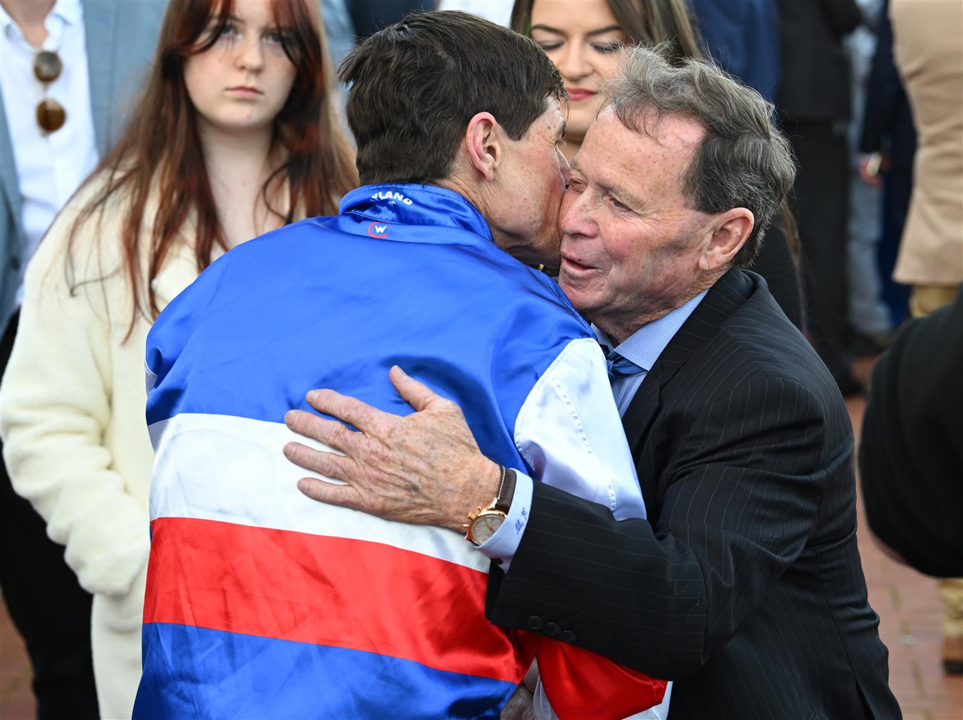 MELBOURNE, AUSTRALIA - SEPTEMBER 12: Craig Williams is congratulated by father Allan Williams after riding Losesomewinmore in race 7, the Bobbie Lewis Quality during Melbourne Racing at Flemington Racecourse on September 12, 2026. (Getty)