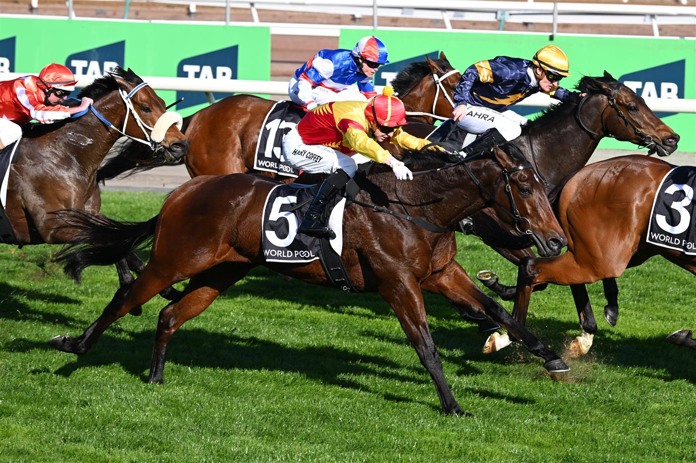MELBOURNE, AUSTRALIA - SEPTEMBER 12: Harry Coffey riding Oliveanotherday #5 during unplaced finish in race 7, the Hkjc World Pool Bobbie Lewis Quality during Melbourne Racing at Flemington Racecourse on September 12, 2026 in Melbourne, Australia. (Photo by Vince Caligiuri/Getty Images)