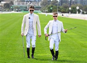 MELBOURNE, AUSTRALIA - SEPTEMBER 12: Jett Stanley and Jabez Johnstone walk the track ahead of Melbourne Racing at Flemington Racecourse on September 12, 2026 in Melbourne, Australia. (Photo by Vince Caligiuri/Getty Images)