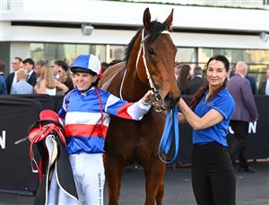 MELBOURNE, AUSTRALIA - SEPTEMBER 12: Craig Williams poses with Losesomewinmore after winning race 7, the Hkjc World Pool Bobbie Lewis Quality during Melbourne Racing at Flemington Racecourse on September 12, 2026 in Melbourne, Australia. (Photo by Vince Caligiuri/Getty Images)
