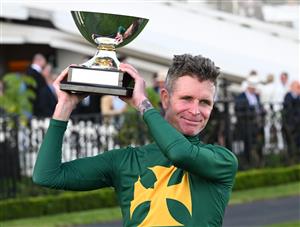 MELBOURNE, AUSTRALIA - SEPTEMBER 12: Luke Nolen poses with trophy after riding Sheza Alibi to win race 8, the Crown Makybe Diva Stakes during Melbourne Racing at Flemington Racecourse on September 12, 2026 in Melbourne, Australia. (Photo by Vince Caligiuri/Getty Images)