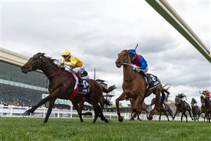 MELBOURNE, AUSTRALIA - SEPTEMBER 20: Craig Williams riding Sir Delius defeats Blake Shinn riding Buckaroo and Jordan Childs riding Golden Path (r) in Race 7, the Sen Underwood Stakes during Melbourne Racing at Caulfield Racecourse on September 20, 2025 in Melbourne, Australia. (Photo by Vince Caligiuri/Getty Images)