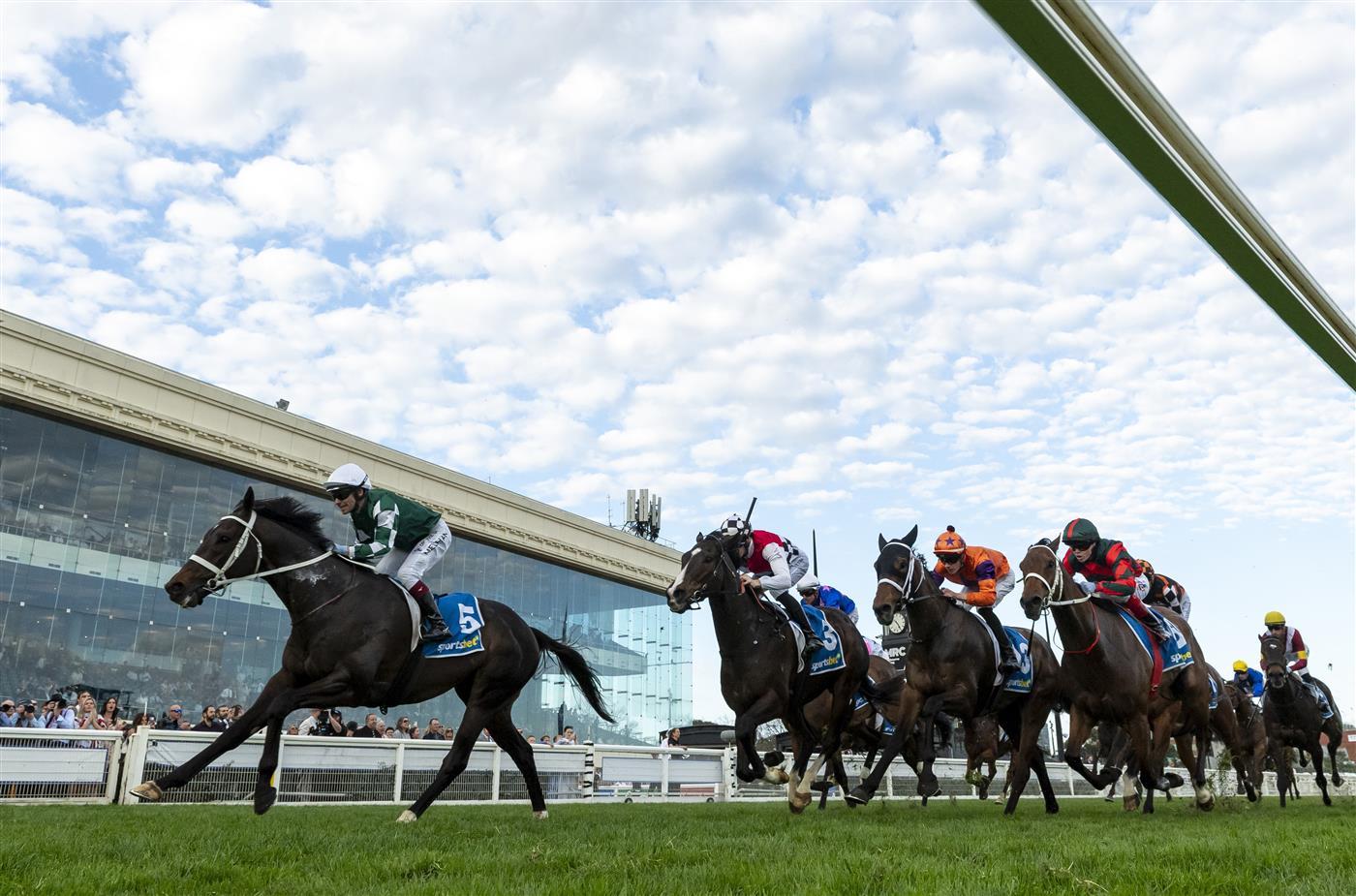 MELBOURNE, AUSTRALIA - SEPTEMBER 19: Ben Melham riding Angel Capital defeats Sepals and Regal Award in race 9, the Sportsbet Sir Rupert Clarke Stakes during Melbourne Racing at Caulfield Racecourse on September 19, 2026 in Melbourne, Australia. (Photo by Vince Caligiuri/Getty Images)